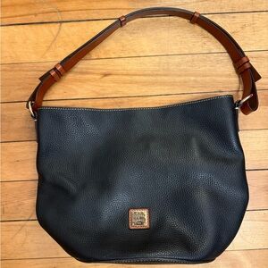 Dooney & Bourke Pebble Black Leather Shoulder Bag, Red Interior and Brown Strap.